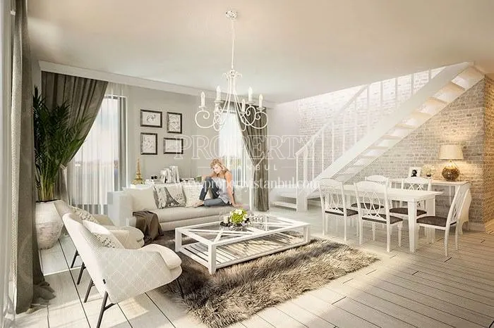 White living room of the duplex flat in Mika Naturalist