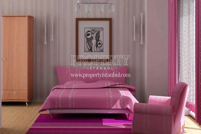 Pink furniture in one of the bedrooms of Mimapalas homes