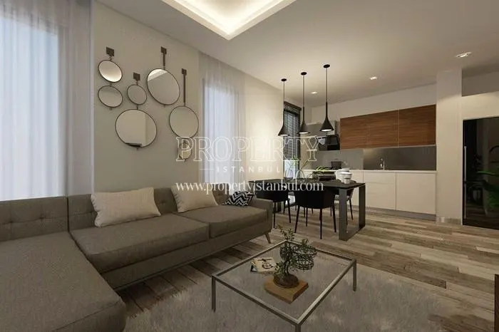 The living room with a small corner sofa in Mint E-5