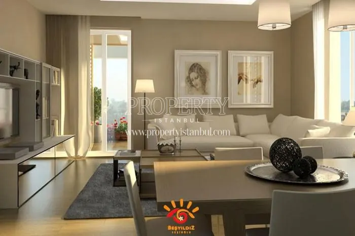 The living room with a white lounge suite in Mira Kurtkoy