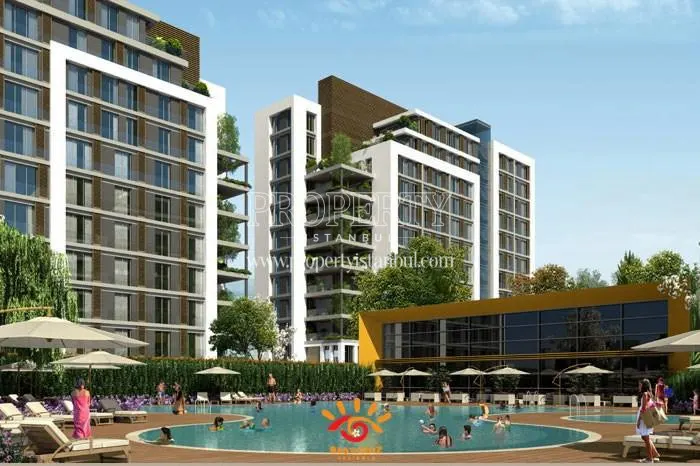 The residents of Mira Kurtkoy swimming in the compound pool