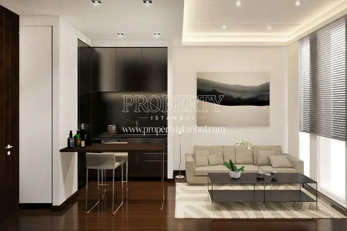 Small living room with a grey sofa in Nef Merter 13