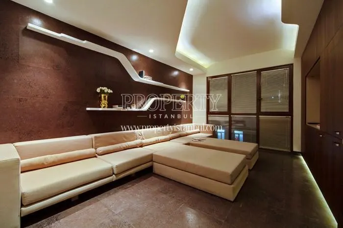 Long cream color sofa in the living room in Nef Merter 13
