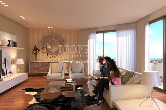The couple watching TV in their home in Newista Residence