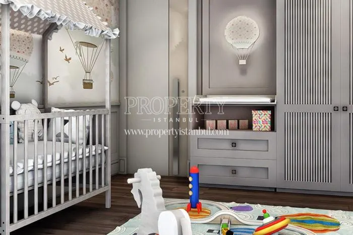 The cradle and toys in the baby room in Nidapark Istinye