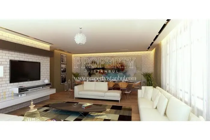 The living room with a white lounge suite in Nova Suites Kagithane