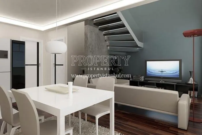 The living room of the duplex flat in Nuans Residence