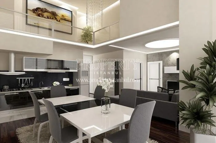 Grey and white decorated duplex apartments in Nuans Residence