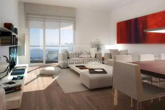 White lounge suite in the small living room in Nuvo Dragos
