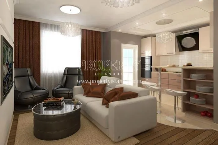 Small living room with two black leather armchairs in Oasis Rezidans