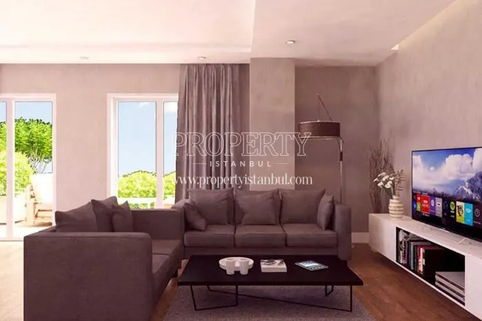 Small living room with a grey lounge suite in Omur Istanbul