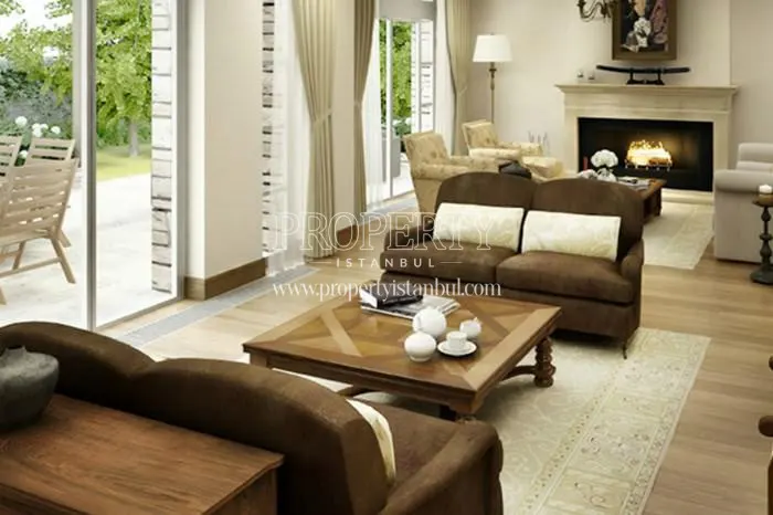 Brown lounge suite with a white pillow in one of the living rooms in Ormanada