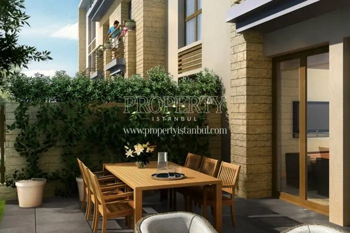 The wooden table and chairs in the garden of Ormanada