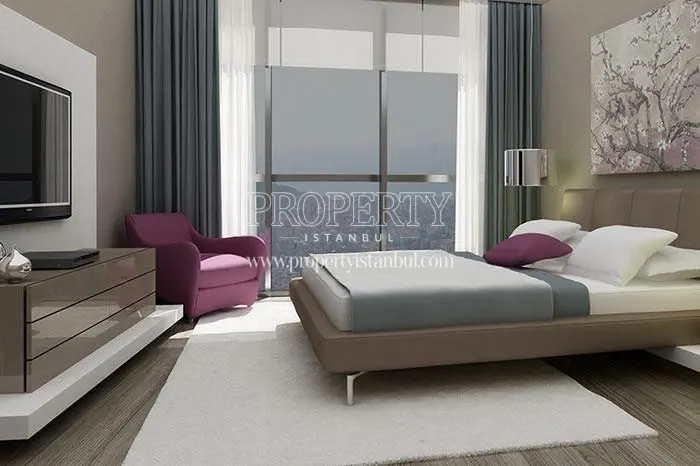 The small master bedroom with a TV in Oryapark Istanbul