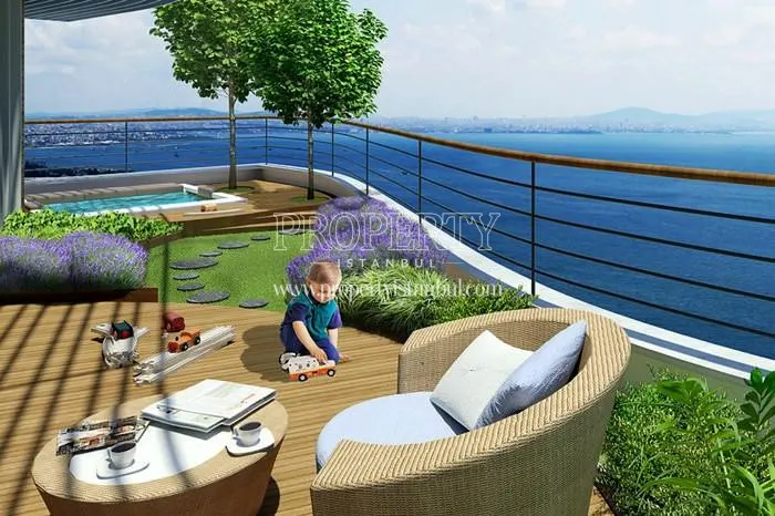 The boy playing on the terrace in Ottomare Suites