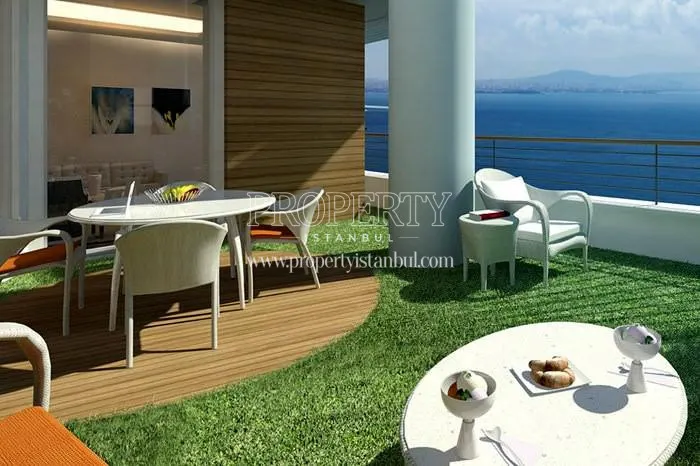 White table and chairs on the viewing terrace in Ottomare Suites