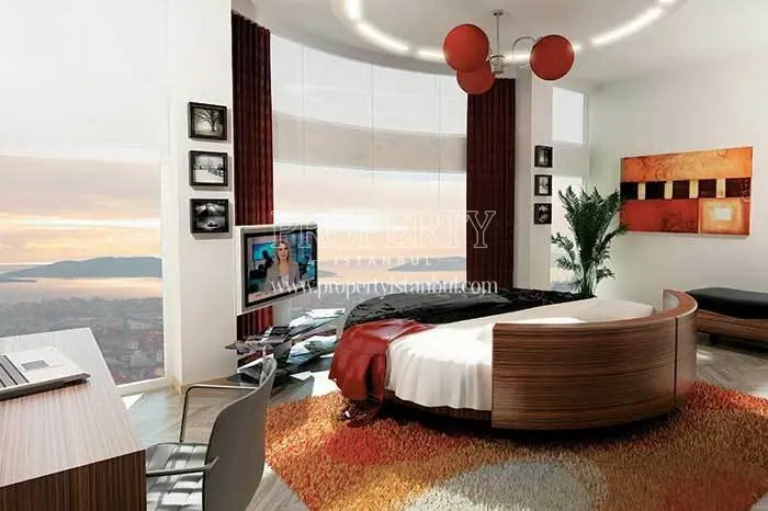 Round master bed facing the sea view in one of the bedrooms in Own Garden Yakacik