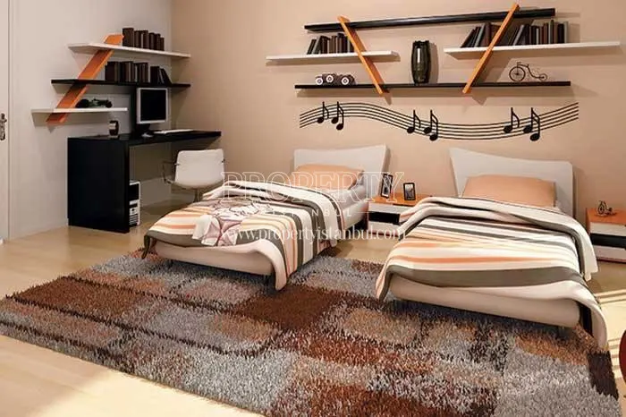 Two single beds in the bedroom in Own Garden Yakacik
