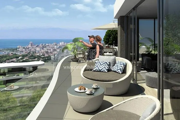 Panorama Hill's residents viewing the sea view from their terrace