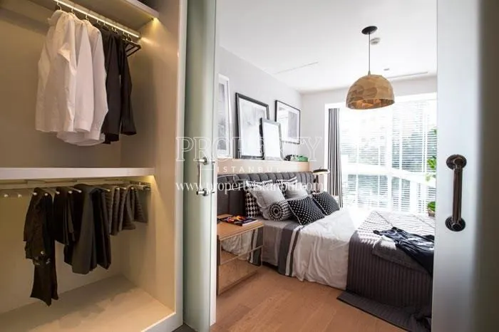 The master bedroom with a dressing room in Park Residences Cadde