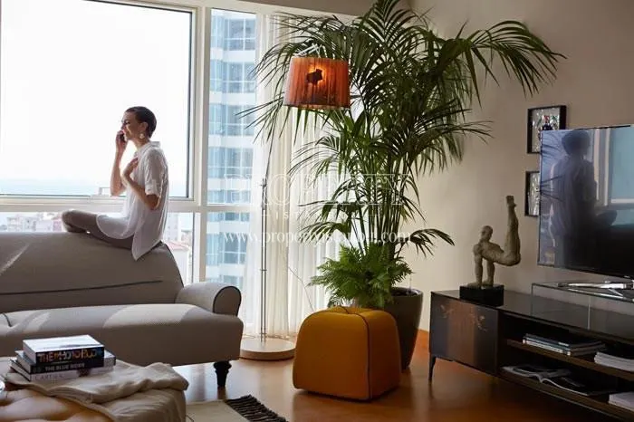 The woman sitting in her home in Park Residences Cadde