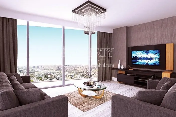 Spacious living room with a city view in Perola Residence