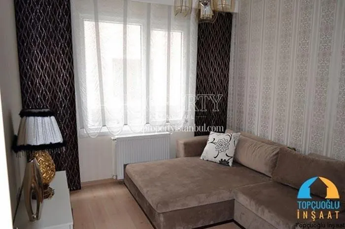 Brown corner suite in the small living room in Propa Plus Residence