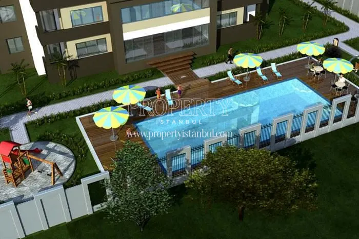 The outdoor swimming pool in Polat Port Residence