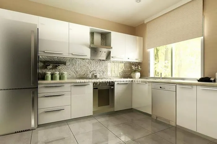 White kitchen in Port Life Tuzla