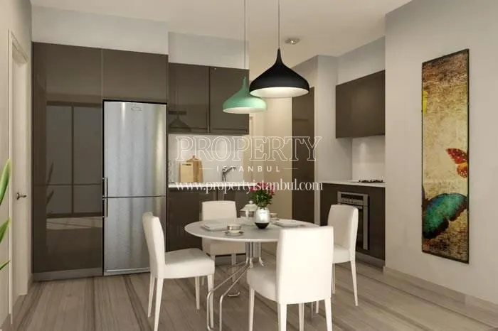 White dining table in the kitchen in Propa Plus Residence