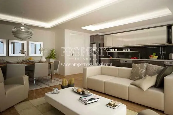 The open kitchen with small living room in Quant Residence