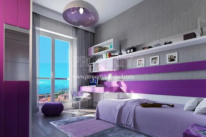 Purple and white furnished bedroom with a sea view in Referans Kartal Kordonboyu