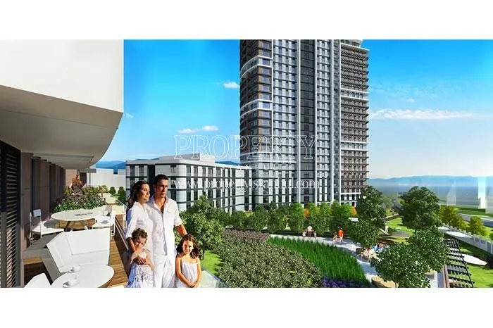 The family on their balcony in Referans Kartal Towers