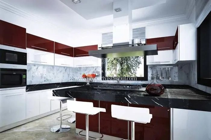 The kitchen with claret red kitchen cabinets in Renaissance Palace