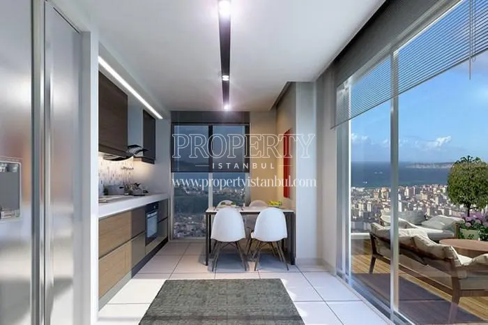 The kitchen with the sea view and balcony in Ronesans Sayfiye