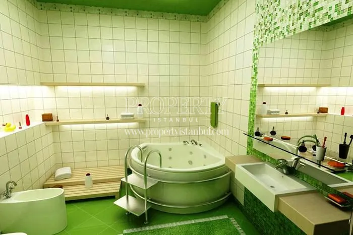 The bathroom with green tiles and white walls in Rose Garden Gurpinar