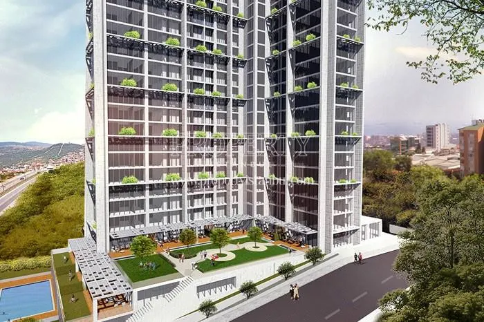 Small verdant garden in front of the Rotamavi Kartal building