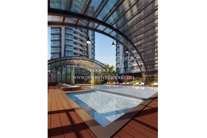 The indoor swimming pool which has a collapsible glass ceiling in Rotana Istanbul