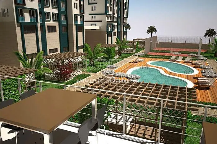 The outdoor swimming pool view from the cafe