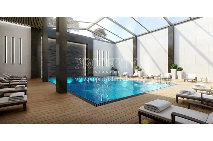 Indoor swimming pool with glass ceiling in Sehir Konaklari