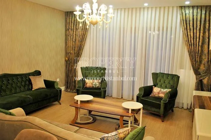 Green lounge suite in one of the living rooms in Sehrigul Konaklari