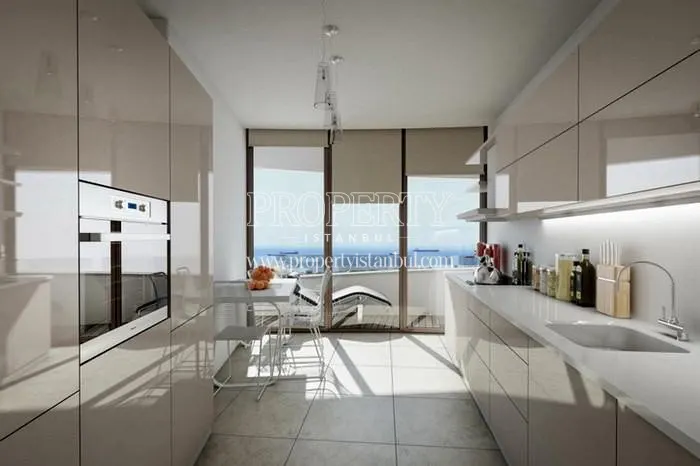 White kitchen with a balcony in Selenium Atakoy