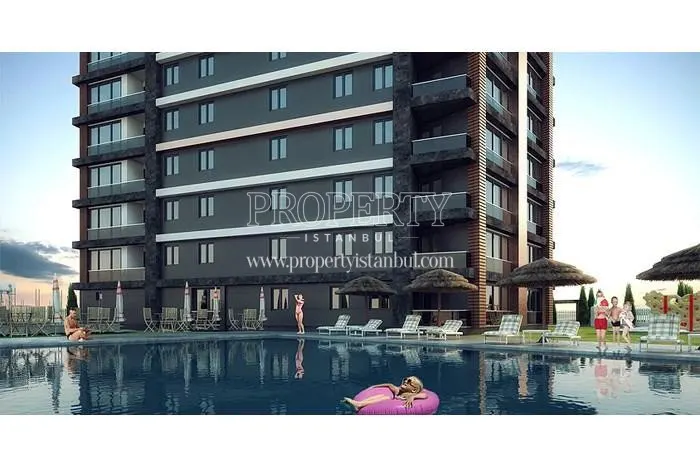 Selin Tower residents swimming in the compound pool