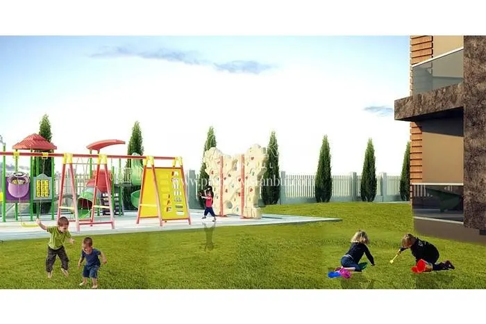 The children playing in the playground for children in the Selin Tower compound