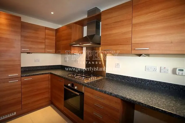 The kitchen with wooden kitchen cabinets in Semerkand Line Bakirkoy