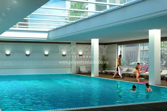 Serenity Kucukkoy residents swimming in the compound pool