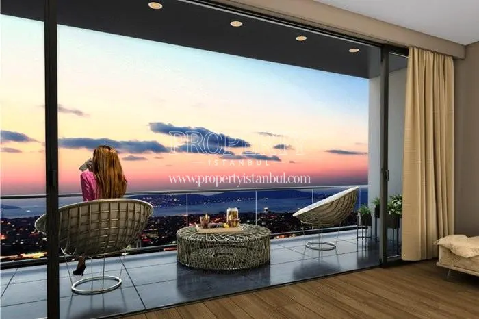 The woman resting on the balcony with the sea view in Serenity Pendik
