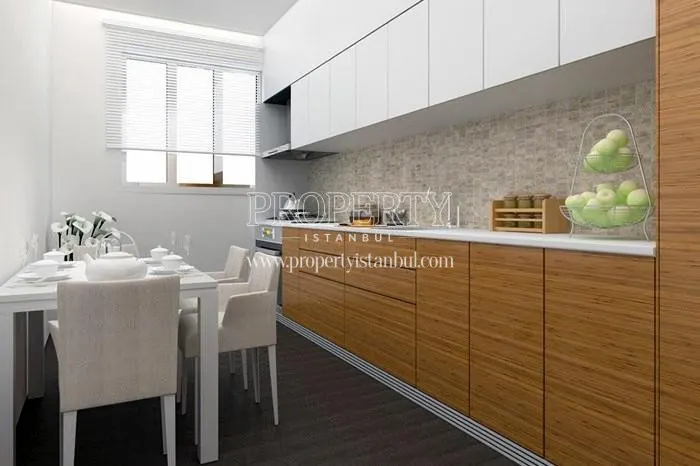 Wooden kitchen cabinet in the small kitchen in Seyirtepe Evleri