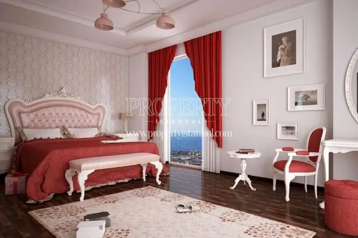 Red and white furnished master bedroom in Sky Blue Istanbul