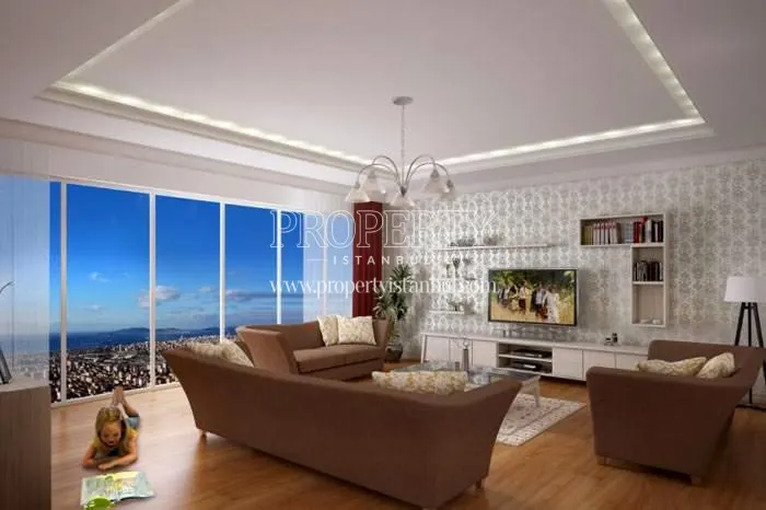 The girl lying on the floor in the living room with the sea view in Sky Blue Istanbul